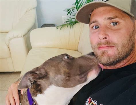 Construction worker adopts neglected dog while working on .